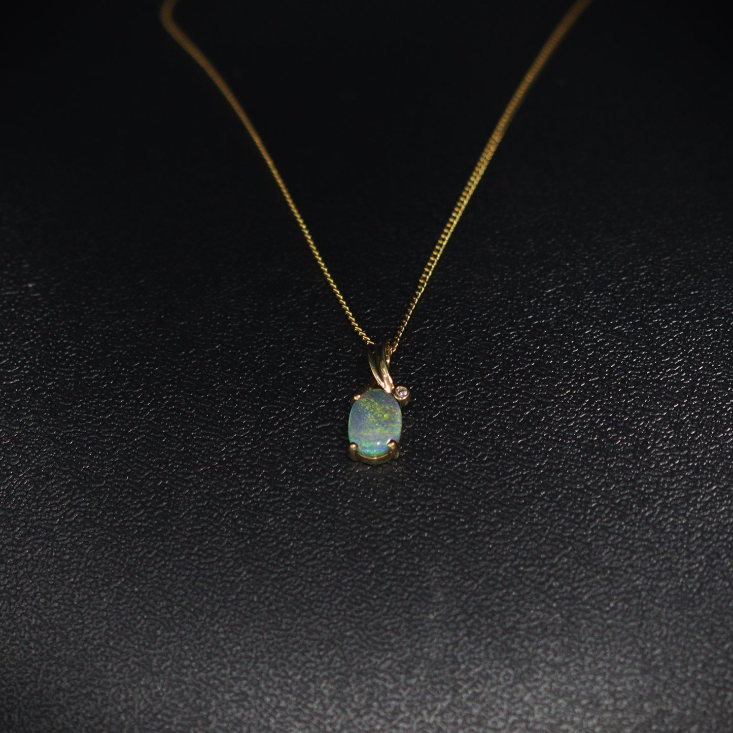 Australian Black Opal 18kt gold pendant 