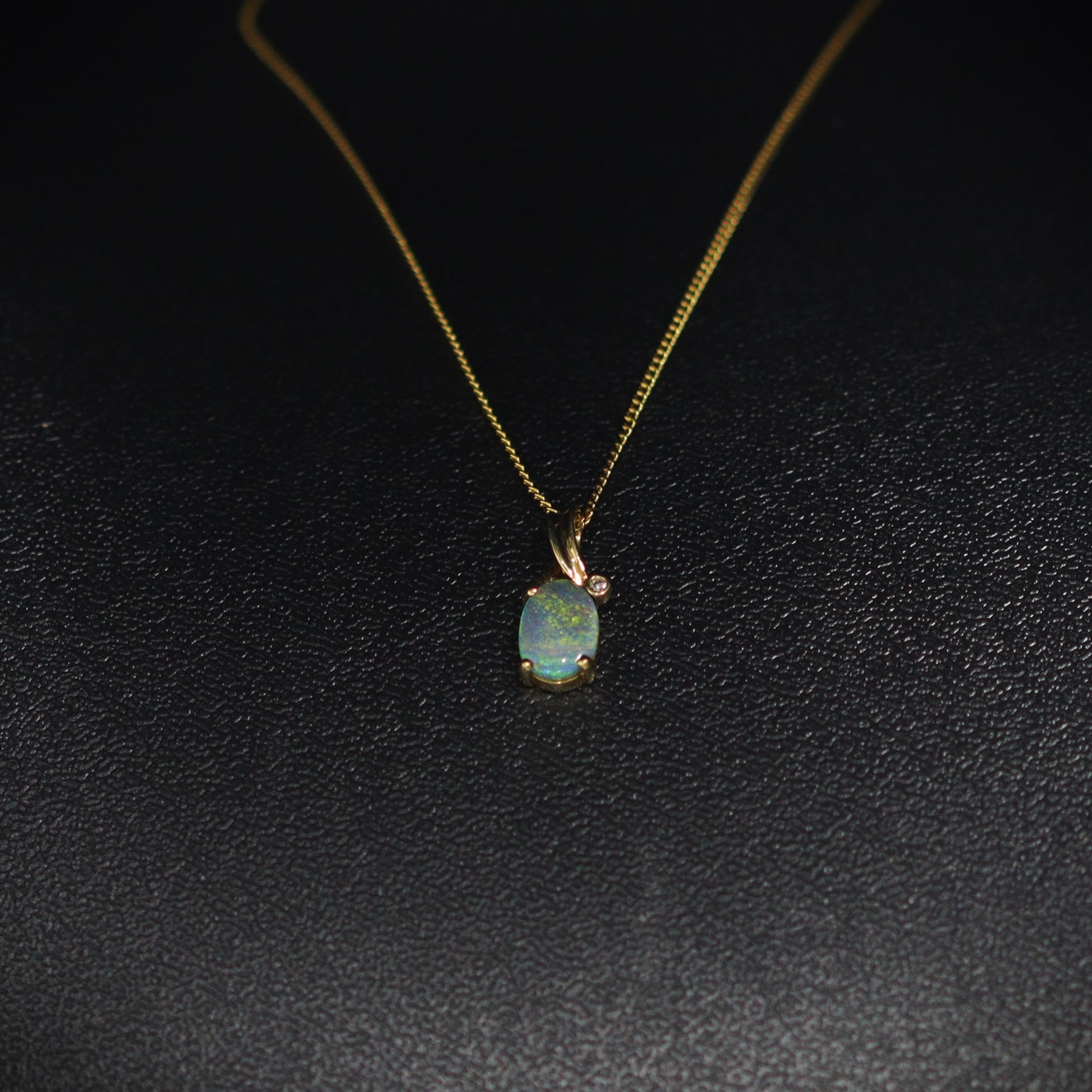 Australian Black Opal 18kt gold pendant 