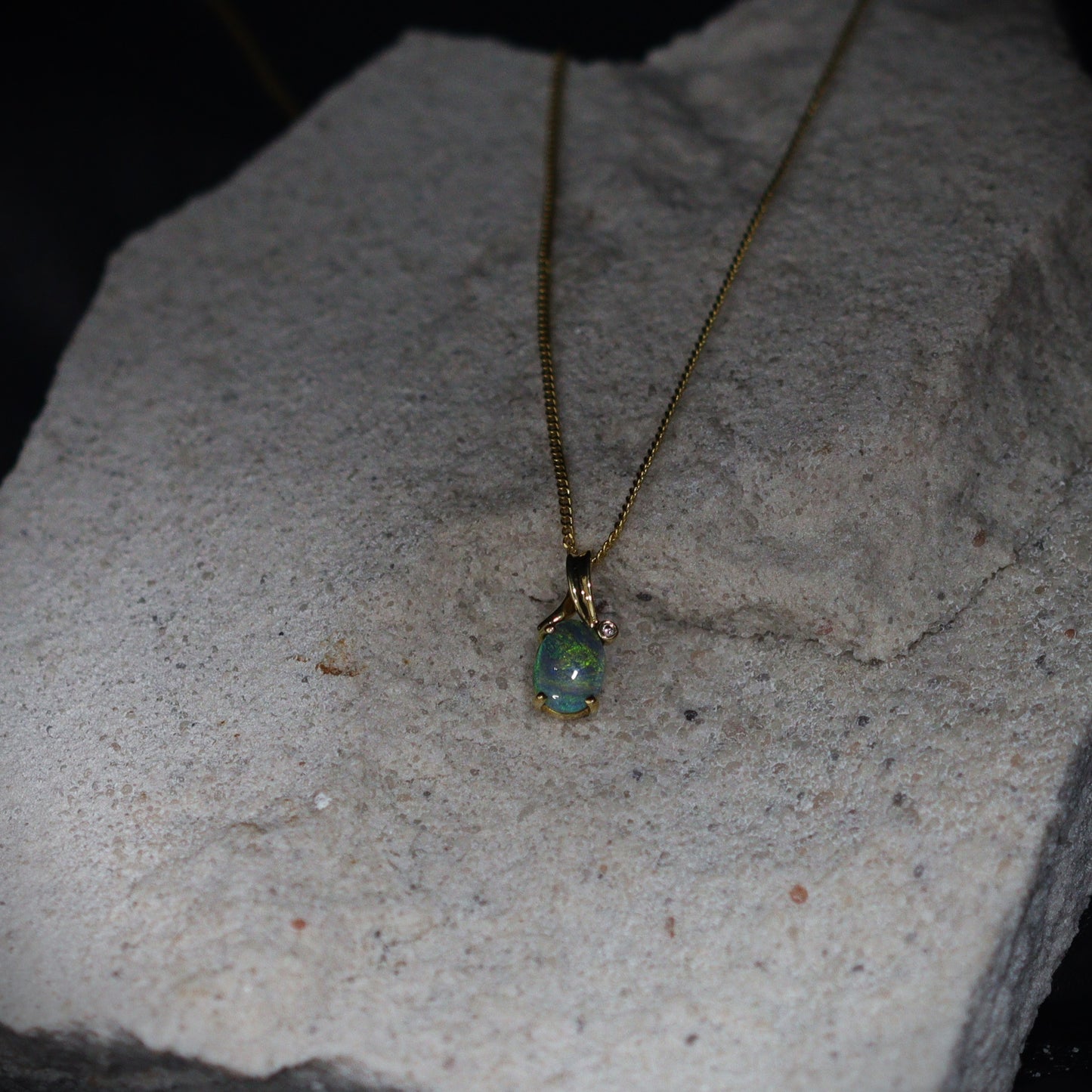 Australian Black Opal 18kt gold pendant 