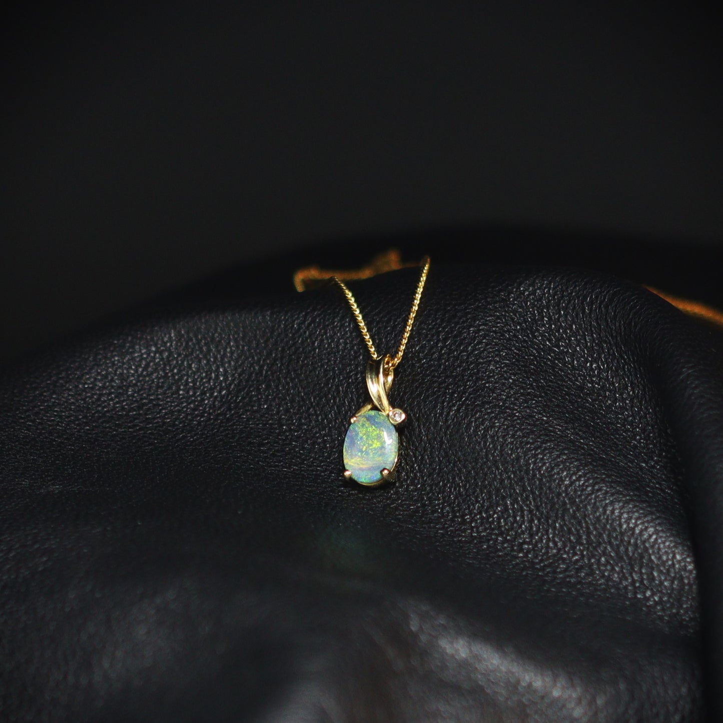 Australian Black Opal 18kt gold pendant 