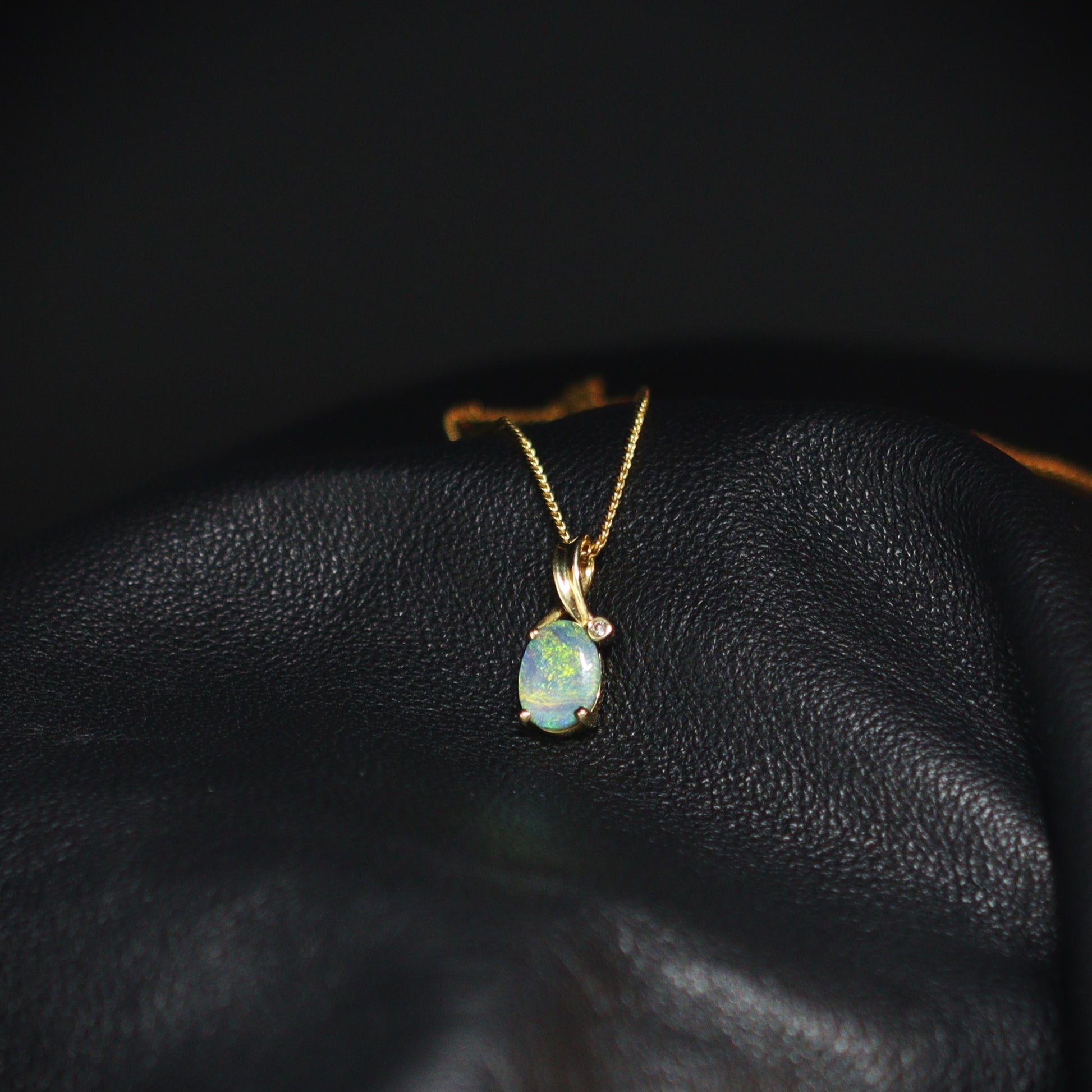Australian Black Opal 18kt gold pendant 