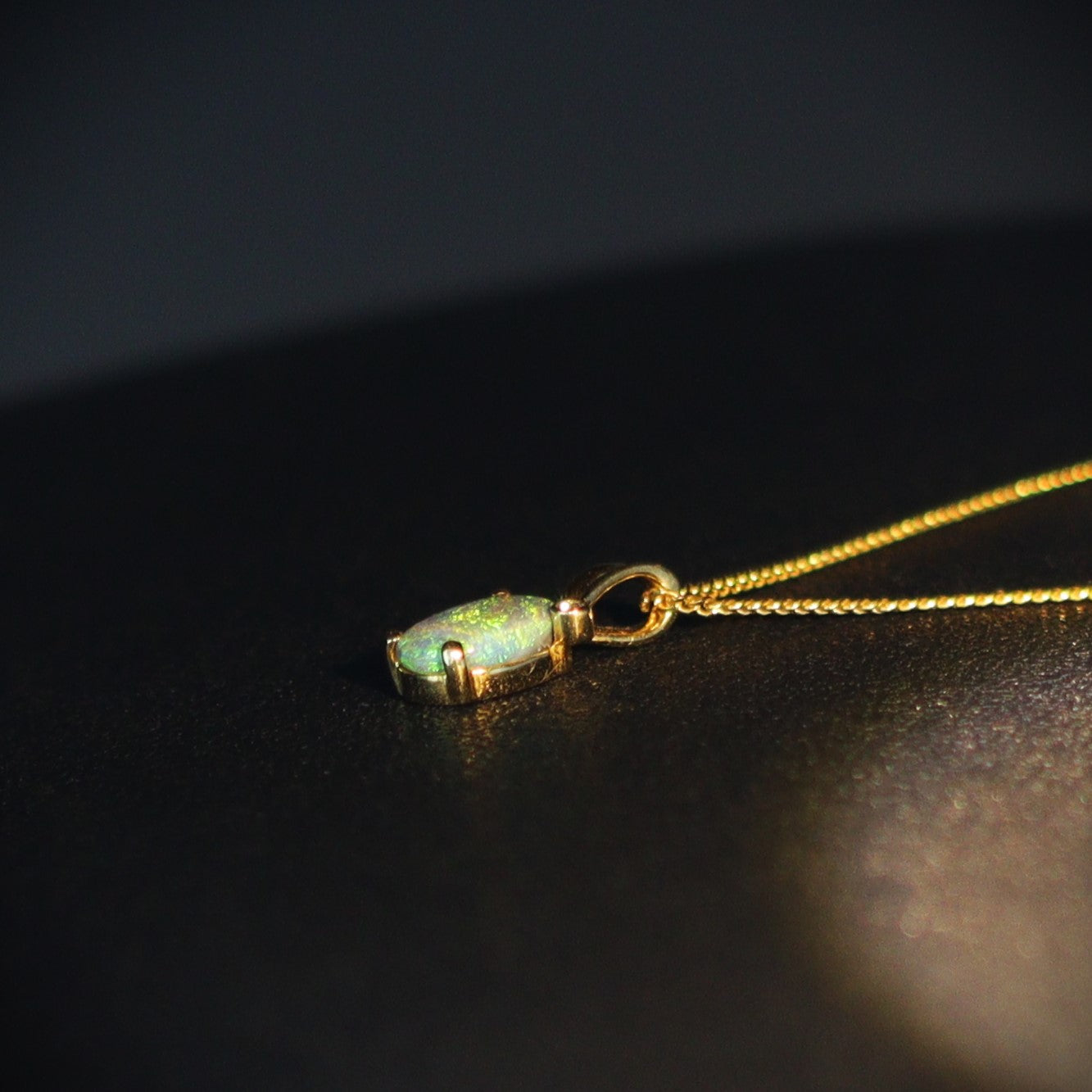 Australian Black Opal 18kt gold pendant 