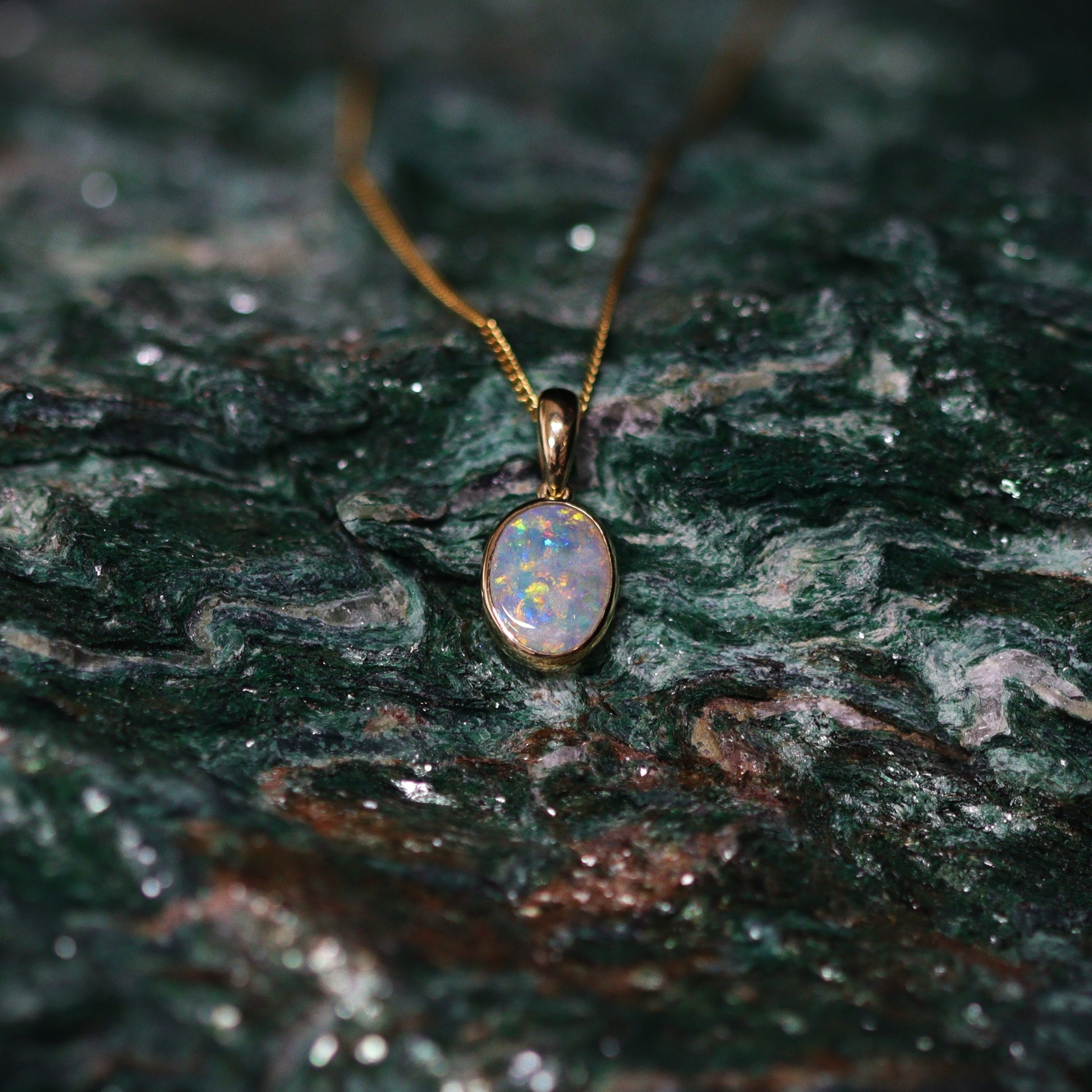Australian Black Opal crystal 18 karat gold pendant 