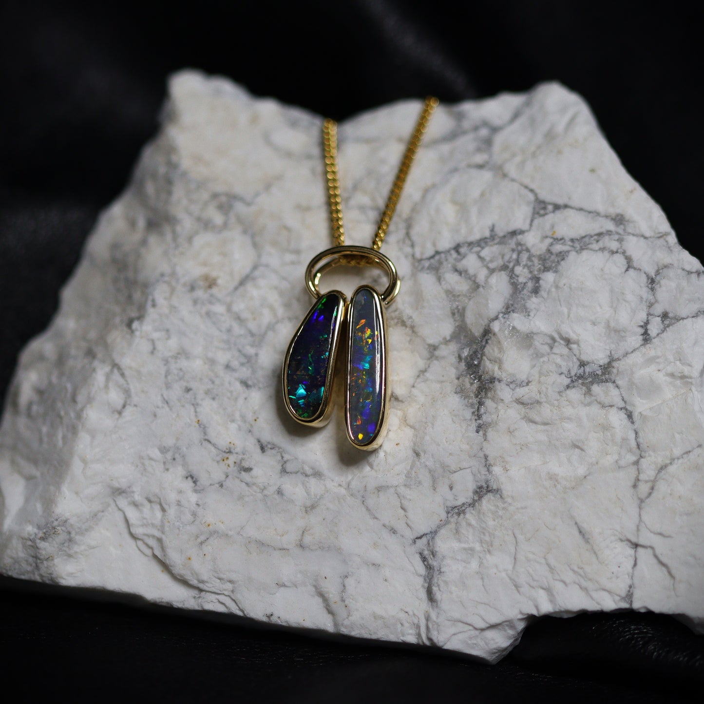 Australian Boulder and Black opal set in 18 K gold pendant
