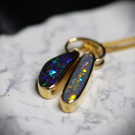 Australian Boulder and Black opal set in 18 K gold pendant