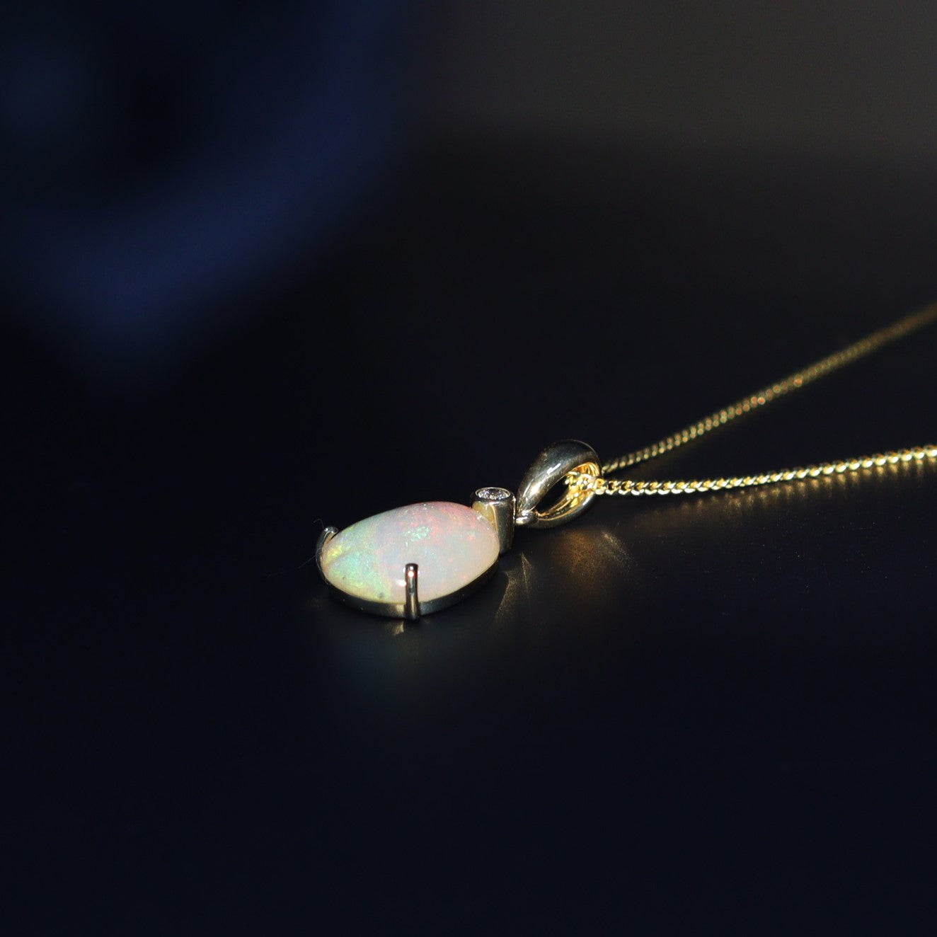 Australian Black Opal Crystal in 18 karat gold pendant 