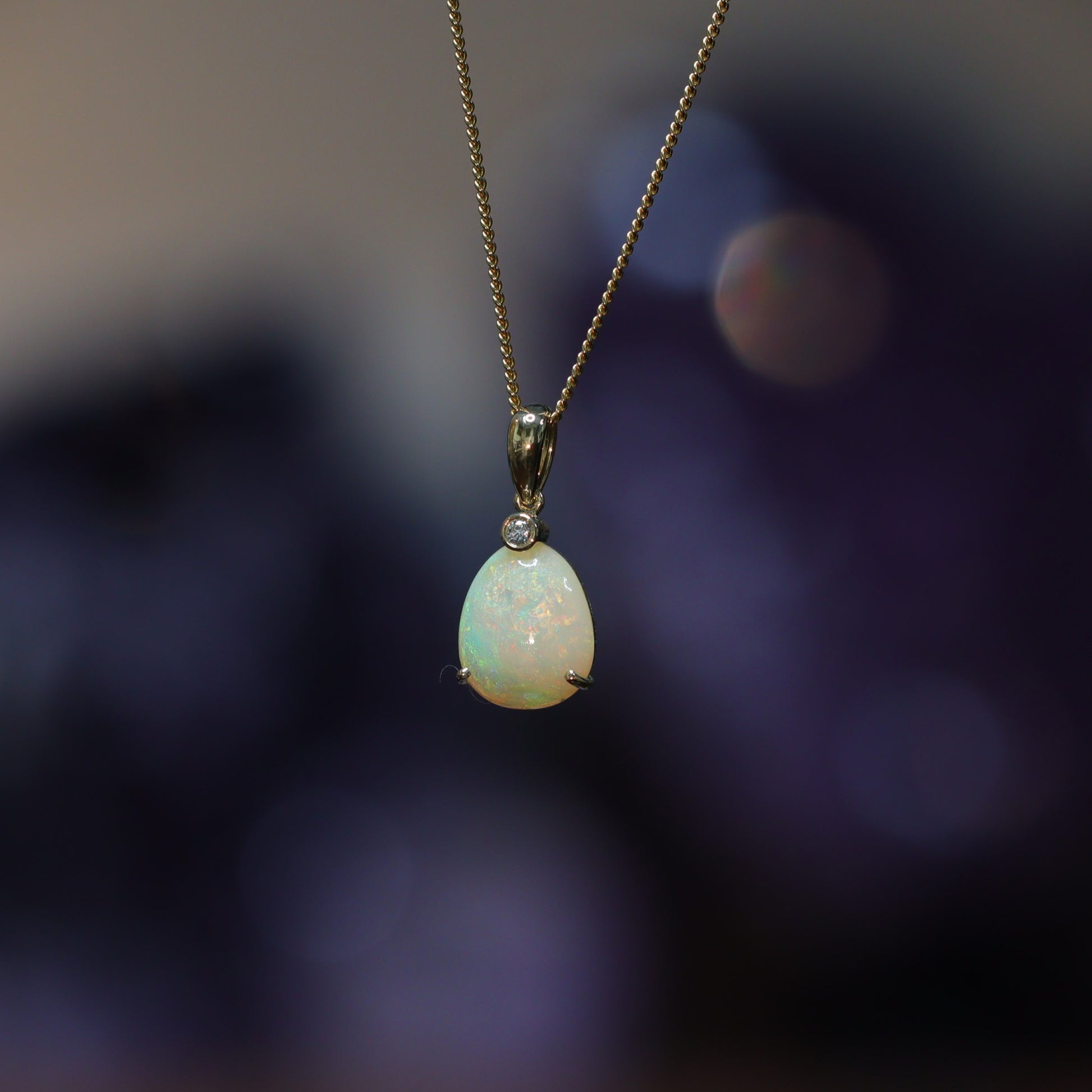 Australian Black solid Opal  in 18 karat gold pendant 