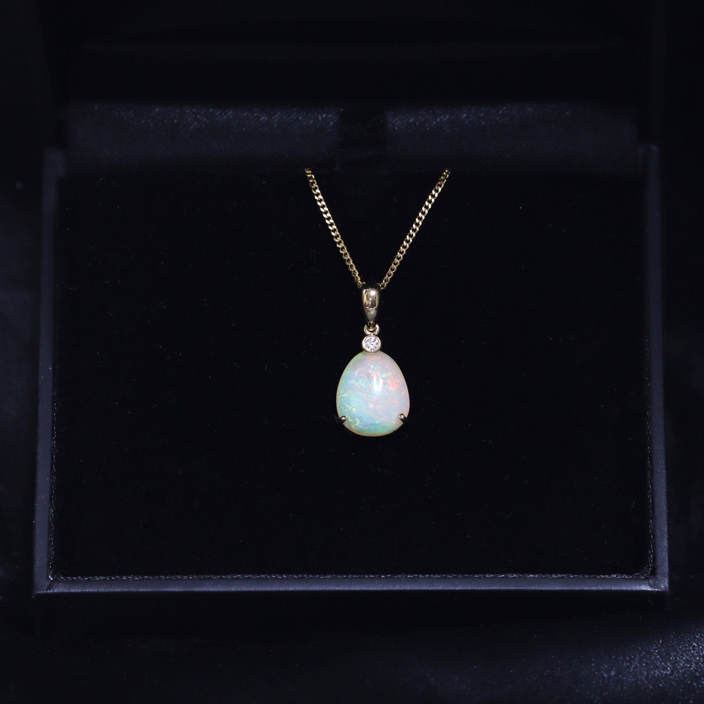 Australian Black Opal Crystal in 18 karat gold pendant 