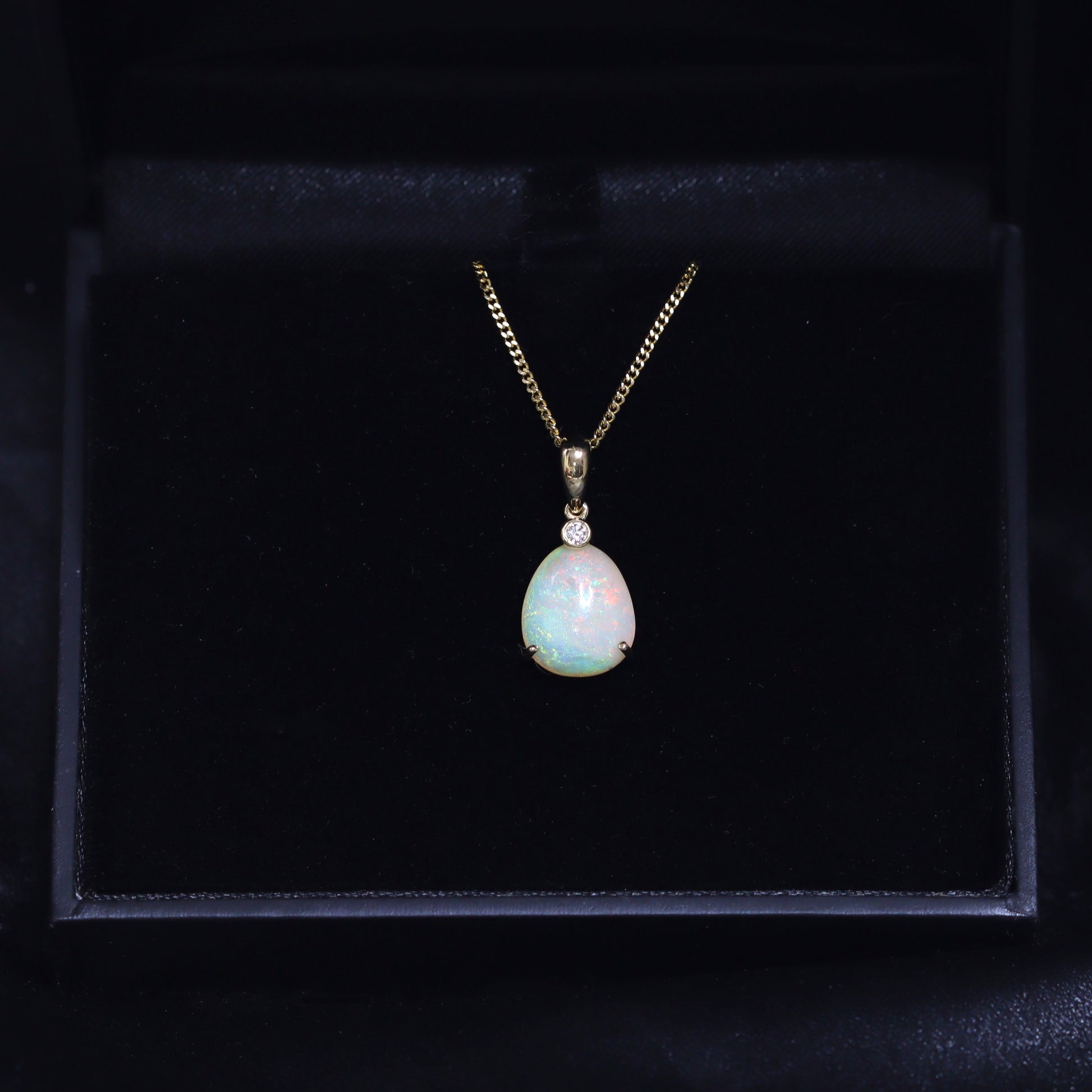Australian Black Opal Crystal in 18 karat gold pendant 