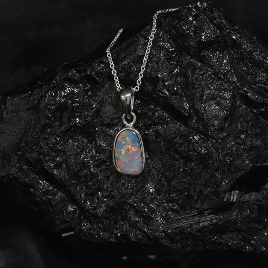 Australian opal doublet set in sterling silver pendant 