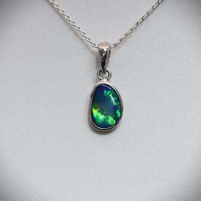 Opal doublet silver pendant on a silver chain 