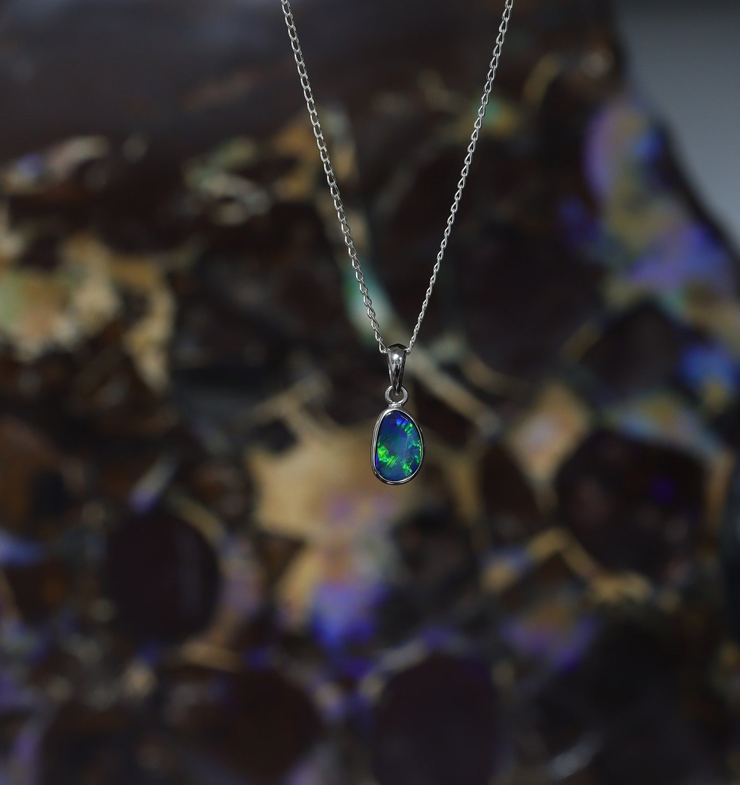 Opal doublet silver pendant on a silver chain 