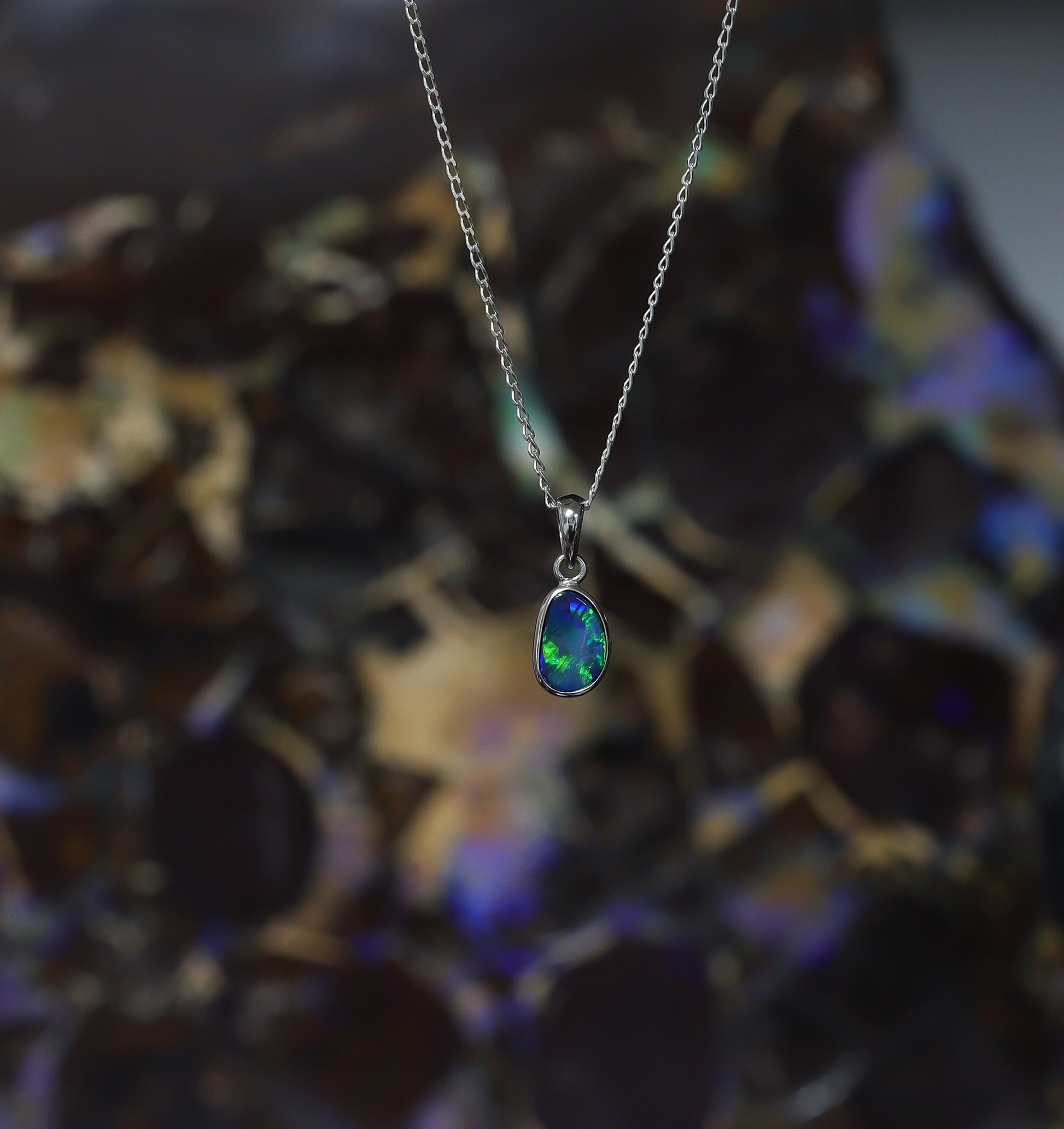 Opal doublet silver pendant on a silver chain 