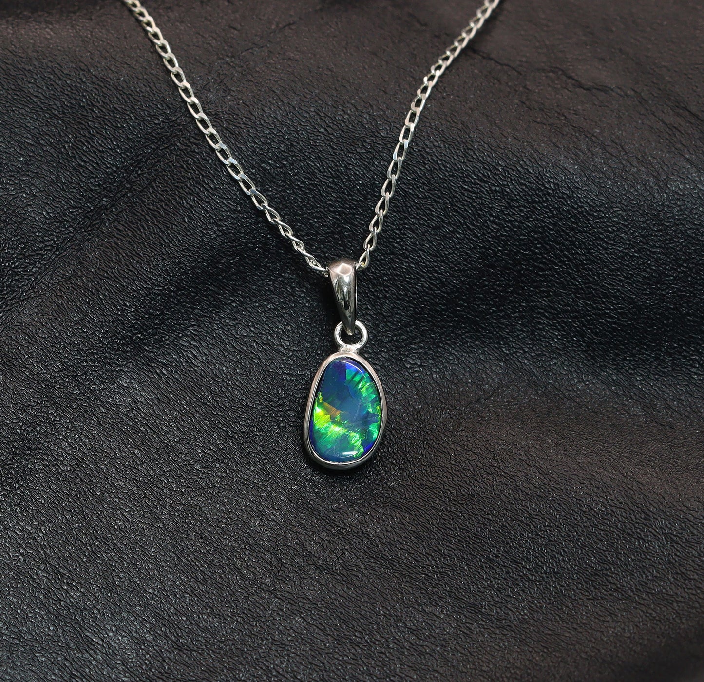 Opal doublet silver pendant on a silver chain 