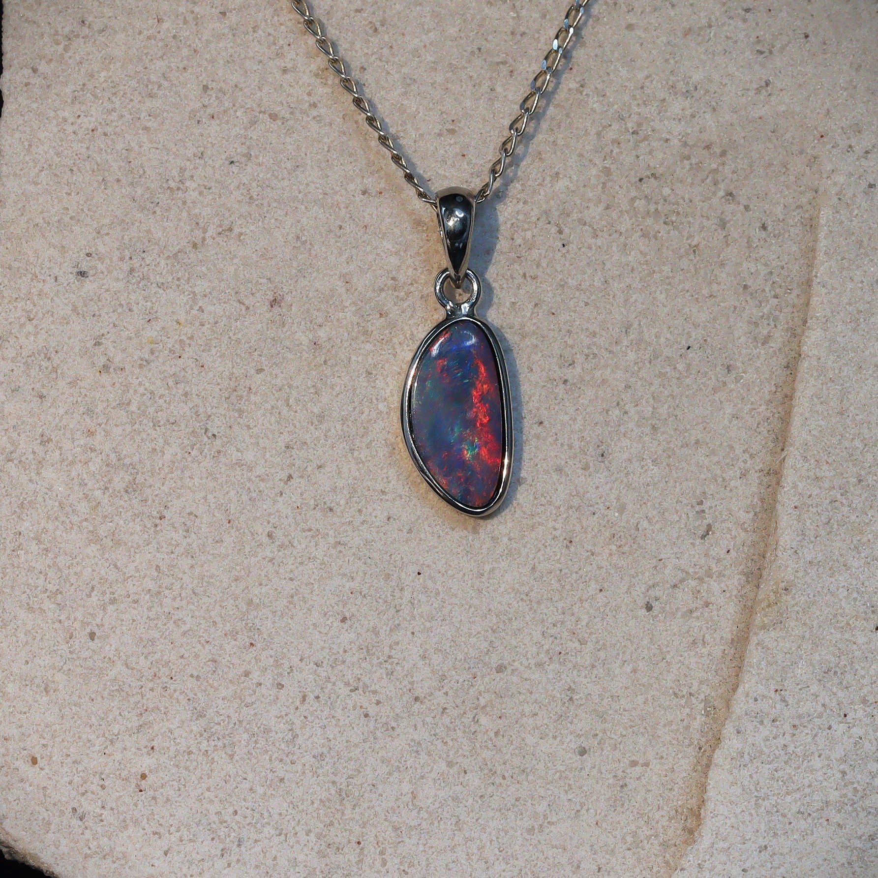 Opal Doublet Pendant – Sterling Silver, 20×8mm, Dominant Red with Blue Flash 2630
