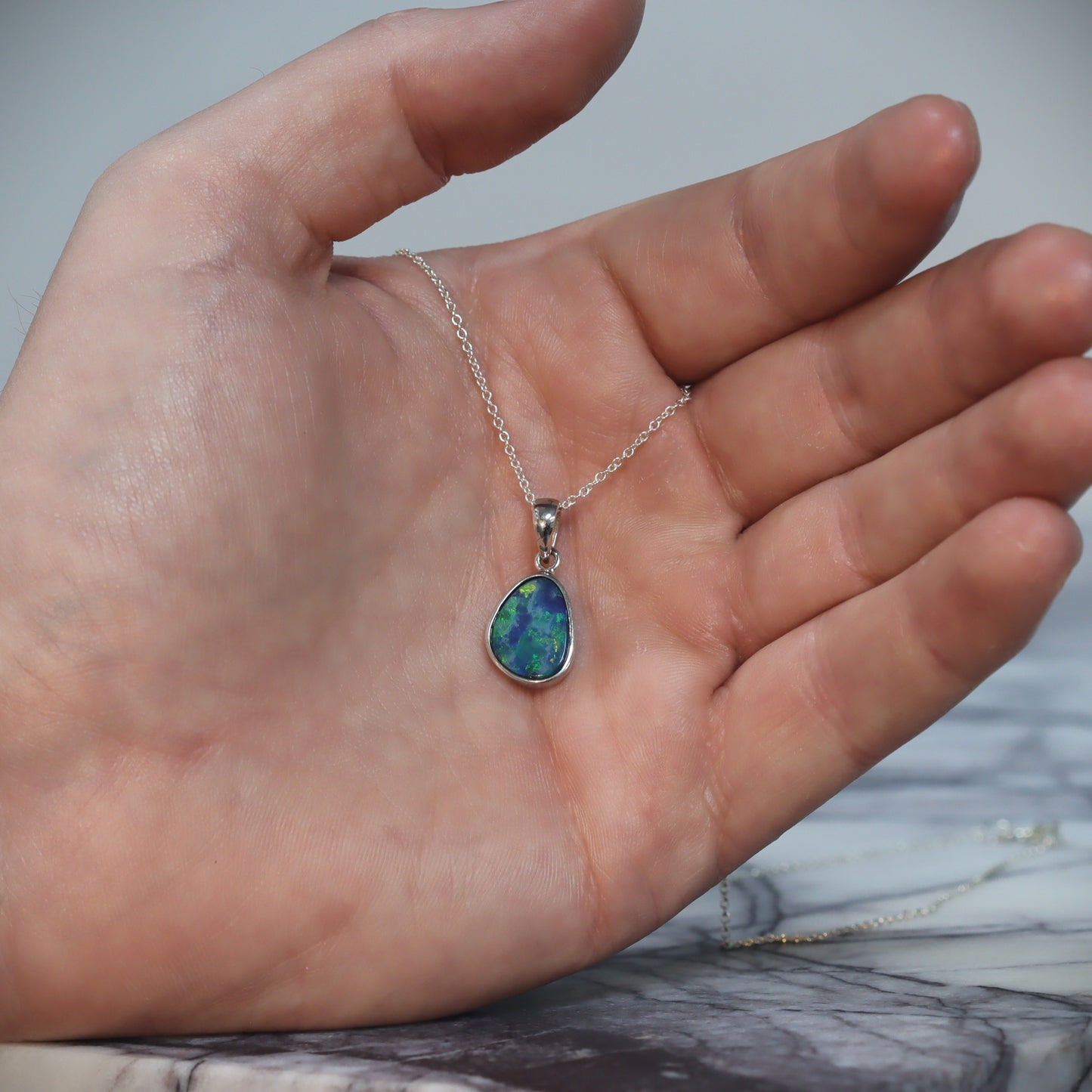Opal Doublet Pendant – Sterling Silver, 12×10mm, Green & Blue Flash 2632