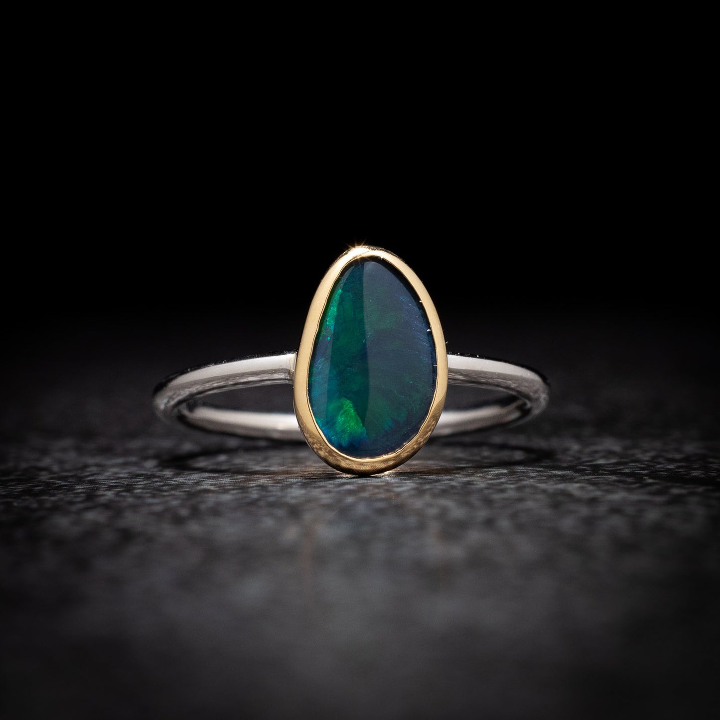 Australian Black Opal in 18 karat Gold and Sterling Silver ring 