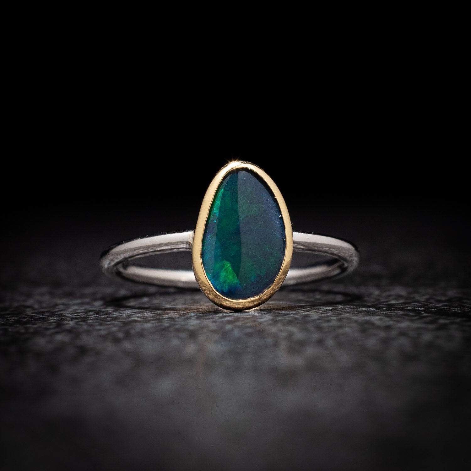 Australian Black Opal in 18 karat Gold and Sterling Silver ring 