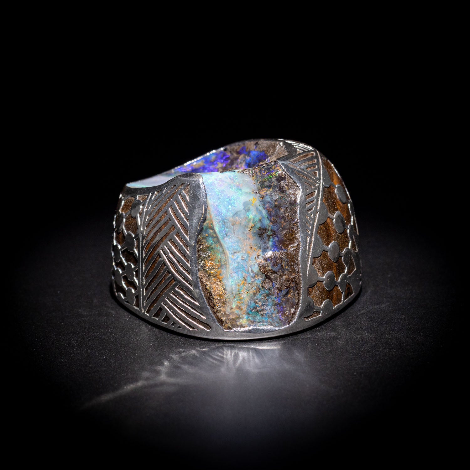 Australian Boulder opal specimen in pure silver art