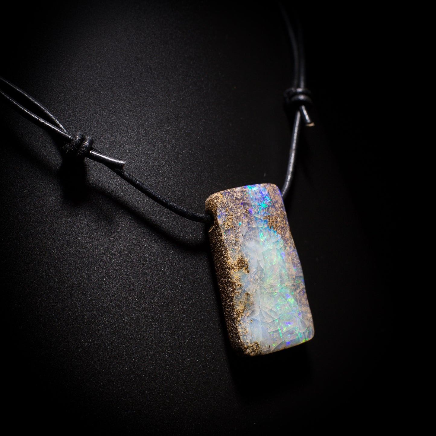 Australian Boulder Opal on leather - 17
