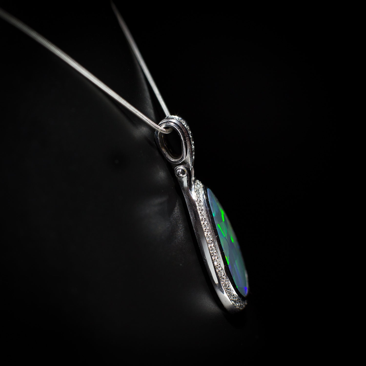 Australian solid Black Opal in 18K WG