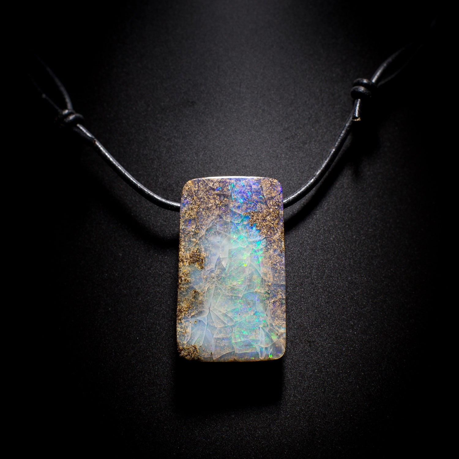 Australian Boulder Opal on leather - 17